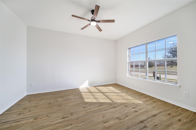 unfurnished room featuring ceiling fan and light hardwood / wood-style flooring