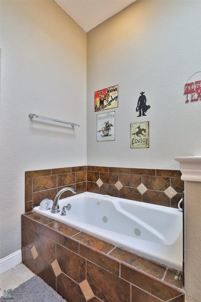 bathroom with a relaxing tiled tub