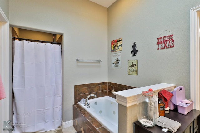 bathroom with tiled bath