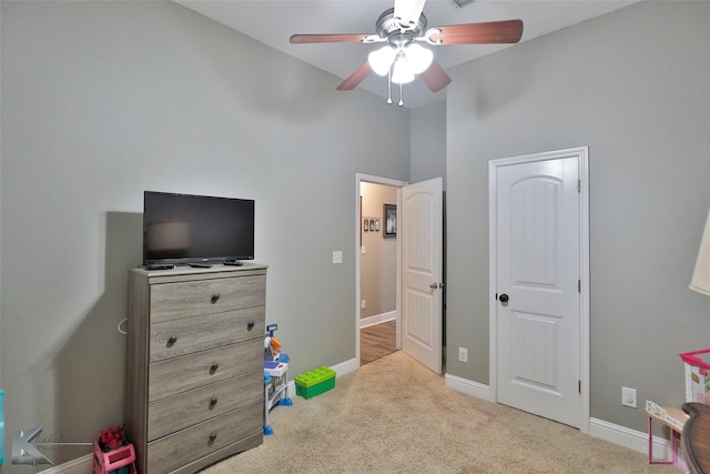 game room featuring ceiling fan and light colored carpet