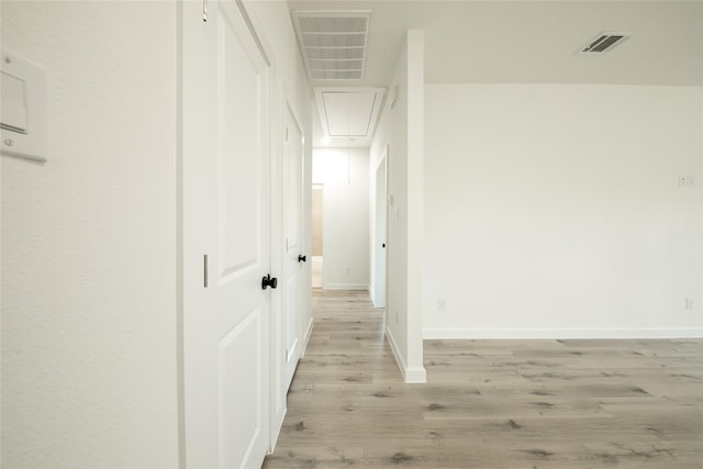 hall featuring light hardwood / wood-style floors