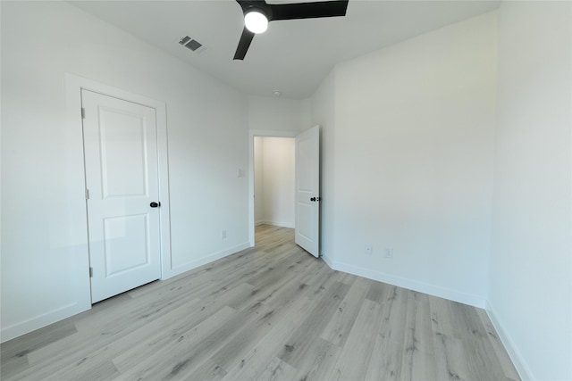 unfurnished bedroom featuring ceiling fan and light hardwood / wood-style flooring