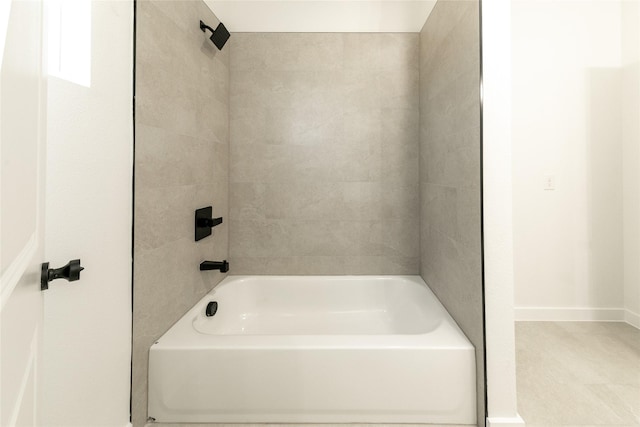 bathroom featuring washtub / shower combination