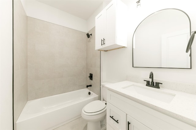 full bathroom with toilet, tiled shower / bath, and vanity