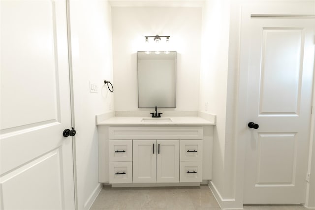 bathroom with vanity and tile patterned floors