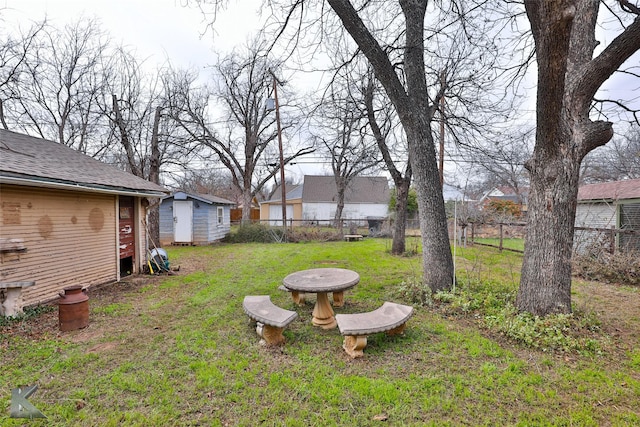 view of yard with a storage shed