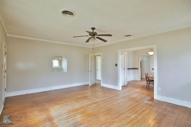 spare room featuring ceiling fan, light hardwood / wood-style flooring, and ornamental molding