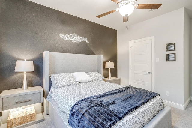 carpeted bedroom featuring ceiling fan