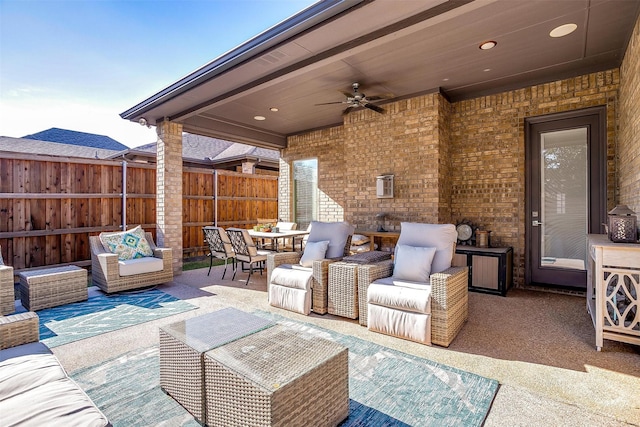 view of patio / terrace with ceiling fan and an outdoor hangout area