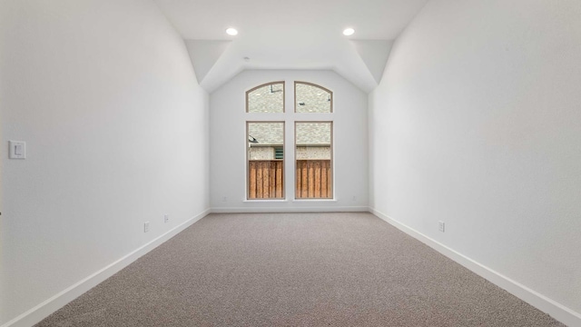 4601 Timberdrift St, Midlothian, TX 76065 - empty room featuring lofted ceiling, light colored carpet, and baseboards