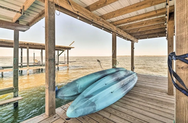 dock area with a water view