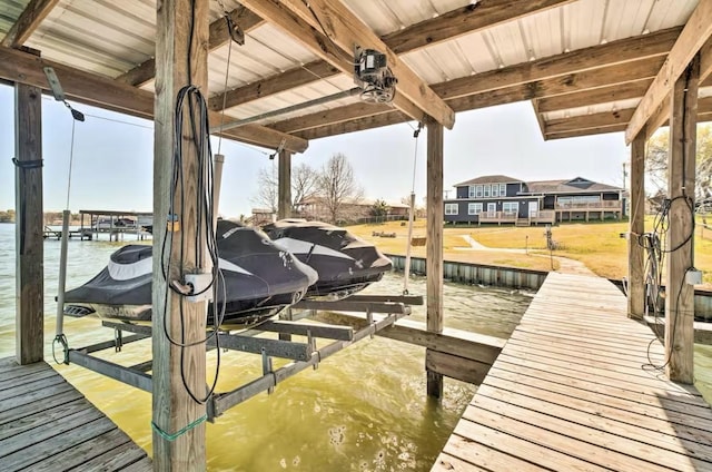 view of dock with a water view