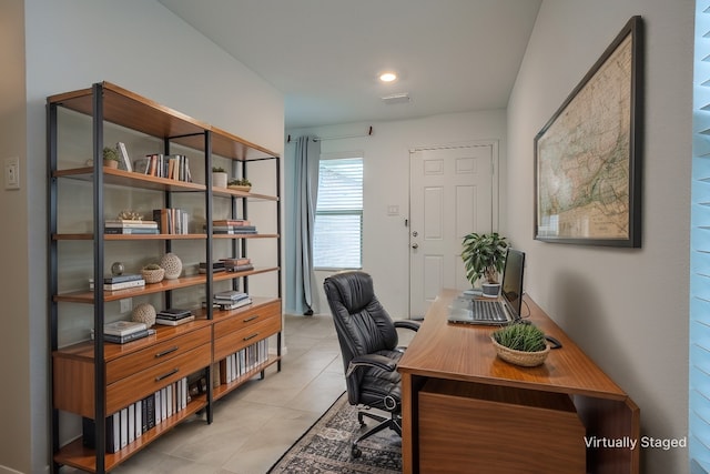 home office with light tile patterned floors