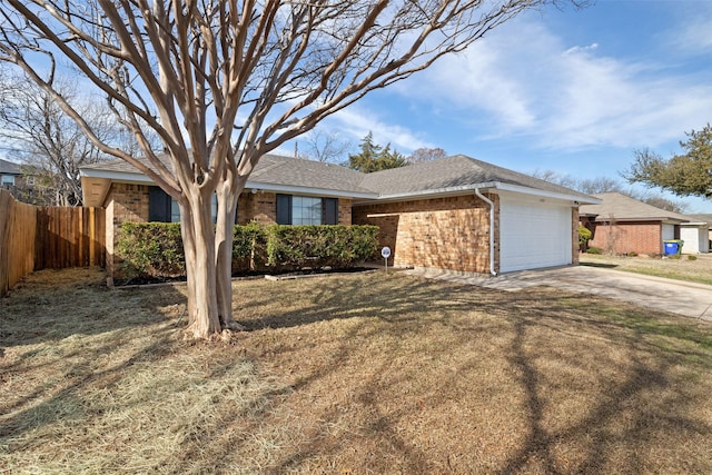 ranch-style house featuring a front lawn and a garage