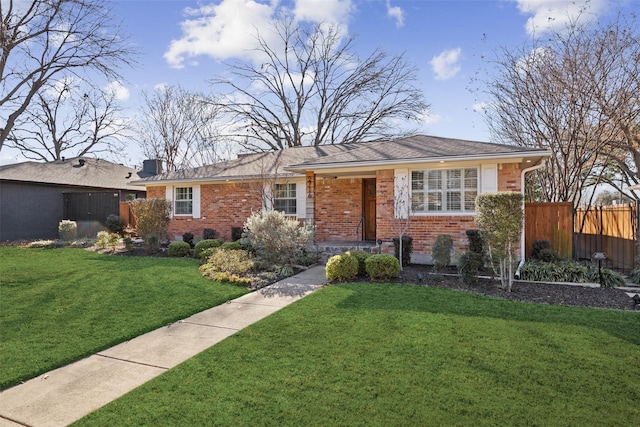 single story home with a front lawn