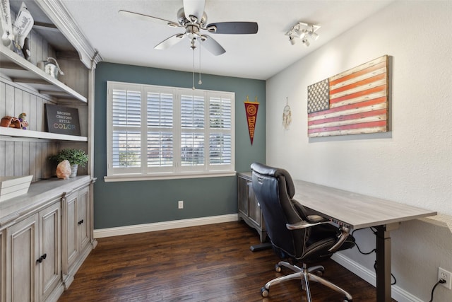 home office featuring dark hardwood / wood-style floors and ceiling fan