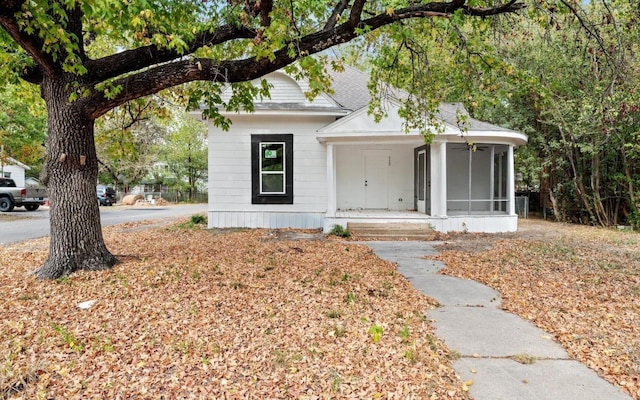 view of front facade featuring a sunroom