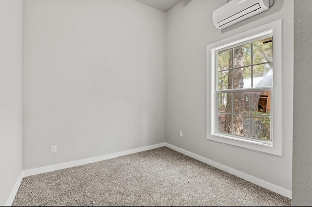 empty room featuring carpet flooring and a wall unit AC