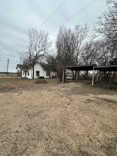 view of yard featuring a carport