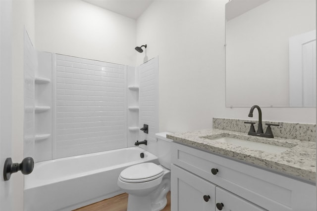 full bathroom with hardwood / wood-style floors, toilet, vanity, and  shower combination