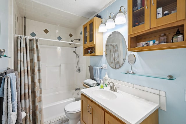 full bathroom with toilet, shower / tub combo, and vanity