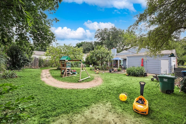 view of jungle gym featuring a lawn