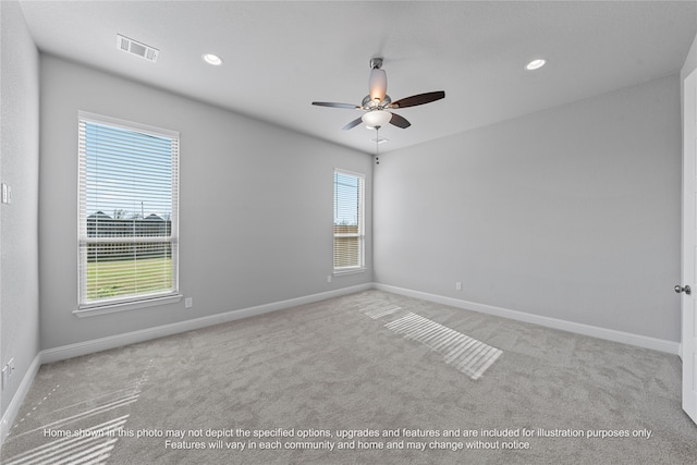 unfurnished room featuring light carpet, baseboards, visible vents, and recessed lighting