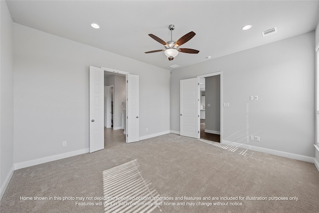 unfurnished bedroom with recessed lighting, carpet flooring, visible vents, and baseboards