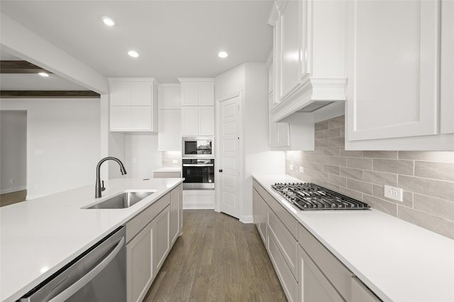 3270 Arbor Grove Trl, Midlothian, TX 76065 - kitchen featuring stainless steel appliances, a sink, light countertops, white cabinetry, and recessed lighting