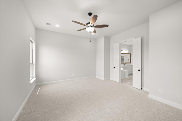 3270 Arbor Grove Trl, Midlothian, TX 76065 - unfurnished bedroom with light colored carpet, recessed lighting, baseboards, and connected bathroom