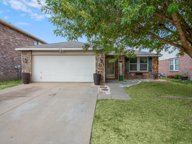 ranch-style home with a garage and a front yard