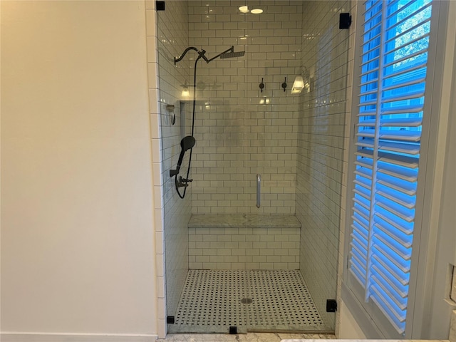 bathroom featuring walk in shower