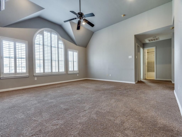 unfurnished room with carpet floors, ceiling fan, and vaulted ceiling