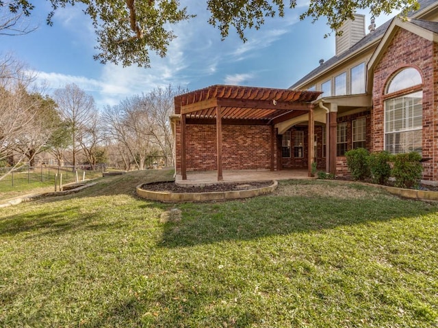 view of yard featuring a patio area and a pergola