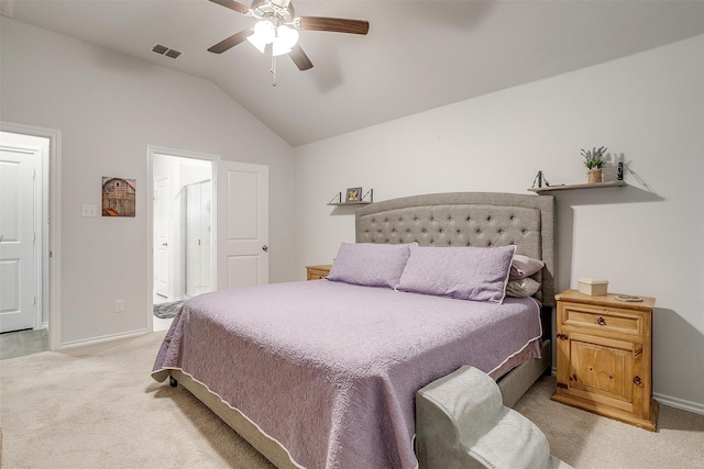 carpeted bedroom with vaulted ceiling and ceiling fan