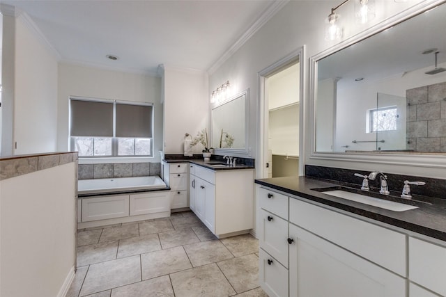 bathroom with crown molding, plus walk in shower, tile patterned floors, and vanity