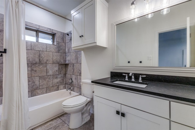 full bathroom with vanity, toilet, tile patterned floors, and shower / bath combo