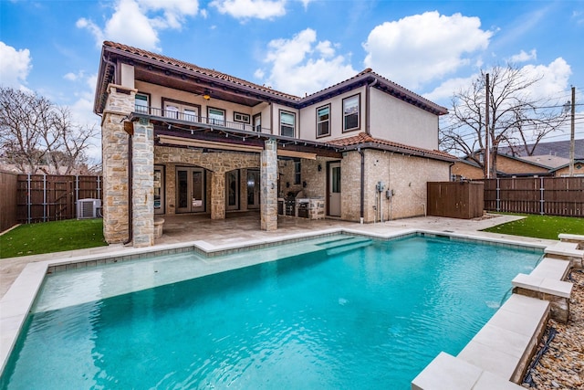 view of pool featuring ceiling fan, a patio area, and cooling unit