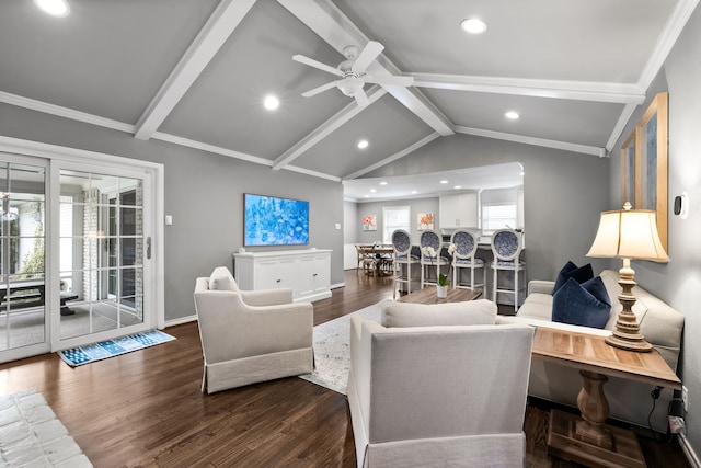 living room with ceiling fan, lofted ceiling with beams, dark wood-type flooring, and ornamental molding