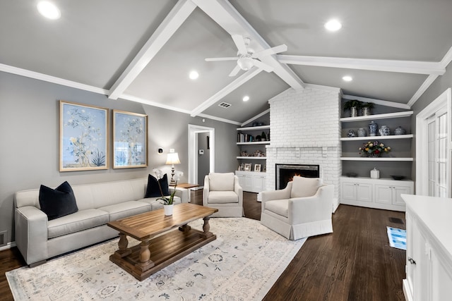 living room with dark wood-type flooring, crown molding, built in features, and lofted ceiling with beams