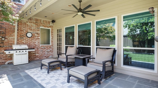 view of patio / terrace with grilling area and ceiling fan