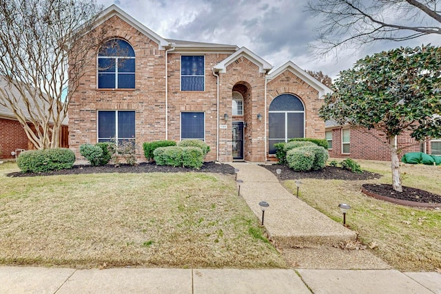 front of property featuring a front lawn