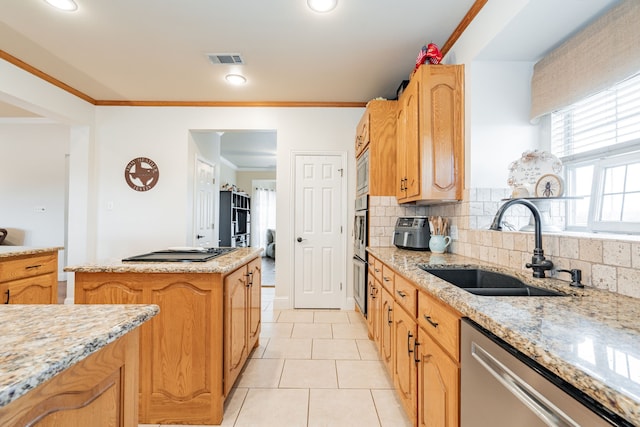 kitchen with decorative backsplash, sink, crown molding, stainless steel appliances, and light tile patterned floors