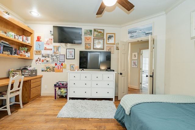 bedroom with ceiling fan, crown molding, and light hardwood / wood-style flooring