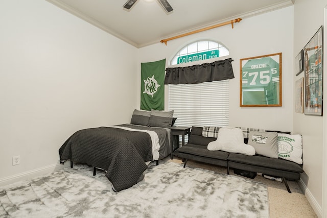 carpeted bedroom with ceiling fan and ornamental molding