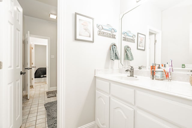 bathroom with vanity and tile patterned flooring