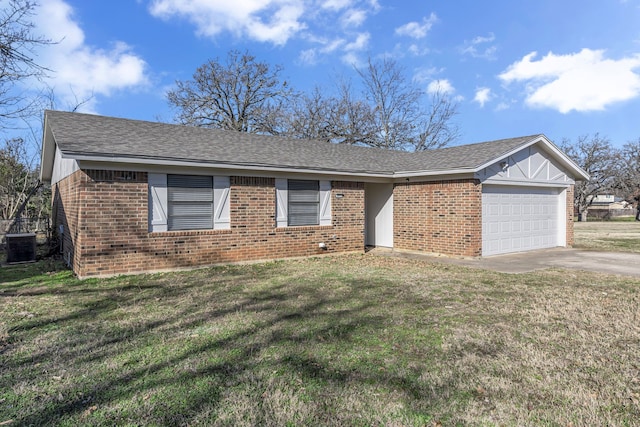 ranch-style house with a front yard, central AC, and a garage