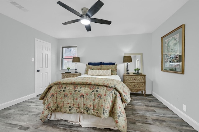 bedroom featuring ceiling fan and wood-type flooring