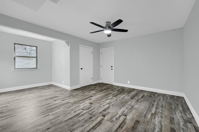 unfurnished room with ceiling fan and hardwood / wood-style floors