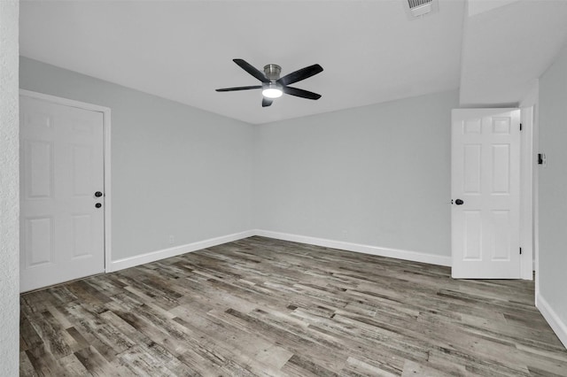 unfurnished room featuring ceiling fan and hardwood / wood-style flooring